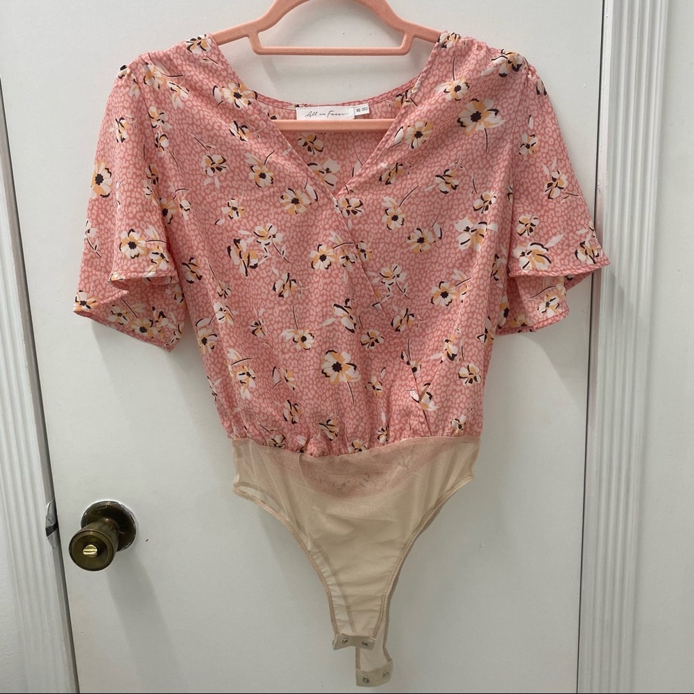 Pink blouse body suit. Size XS worn once.